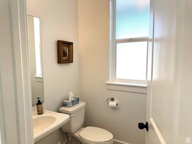352 W Ropelato Dr, Nibley, UT 84321 - bathroom featuring plenty of natural light, toilet, and baseboards
