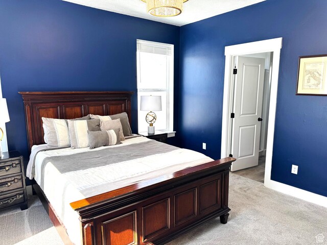 352 W Ropelato Dr, Nibley, UT 84321 - bedroom featuring light carpet and baseboards