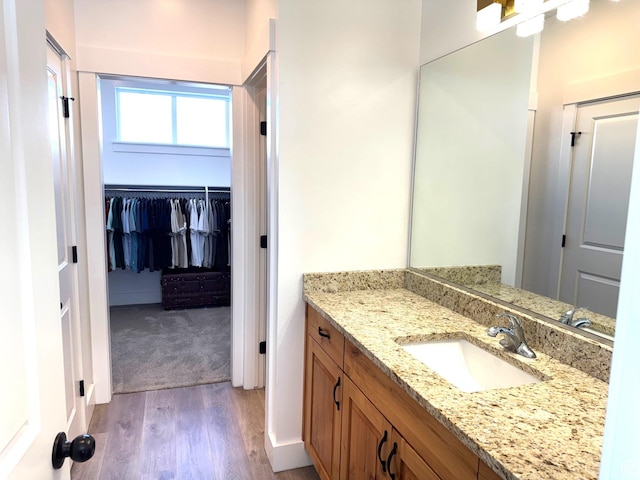 352 W Ropelato Dr, Nibley, UT 84321 - bathroom with wood finished floors and vanity