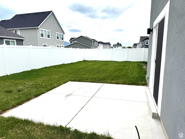 352 W Ropelato Dr, Nibley, UT 84321 - view of yard featuring a patio and a residential view