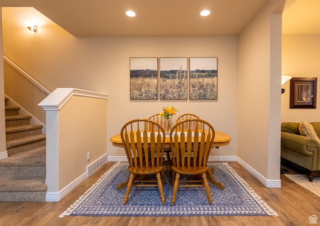 160 S 2775 W, West Point, UT 84015 - dining area with visible vents, wood finished floors, recessed lighting, baseboards, and stairs