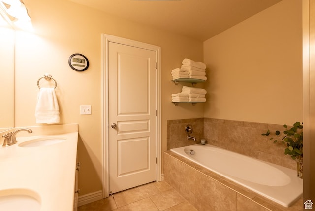 160 S 2775 W, West Point, UT 84015 - bathroom featuring tile patterned flooring, a garden tub, double vanity, and a sink