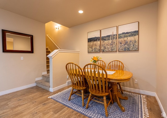 160 S 2775 W, West Point, UT 84015 - dining room with wood finished floors, visible vents, baseboards, recessed lighting, and stairs