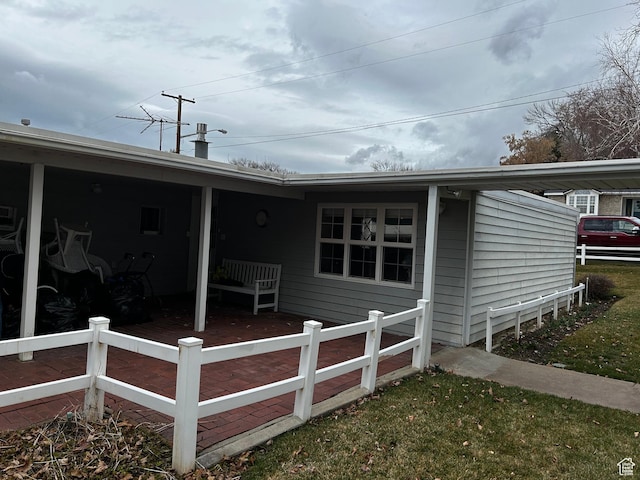 back of property with fence