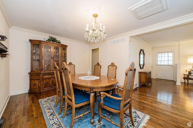 2536 N 575 E, North Ogden, UT 84414 - dining room featuring a chandelier, ornamental molding, wood finished floors, and baseboards