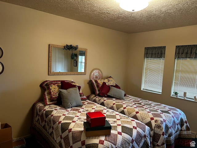 bedroom featuring a textured ceiling