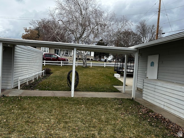 view of yard with a carport