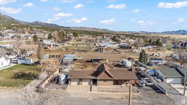 aerial view with a mountain view and a residential view