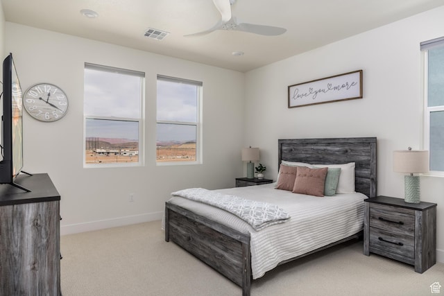 757 W Periwinkle Ln Unit 210, St George, UT 84790 - carpeted bedroom with baseboards and a ceiling fan