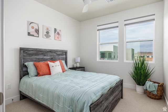 757 W Periwinkle Ln Unit 210, St George, UT 84790 - bedroom with carpet floors, baseboards, and ceiling fan