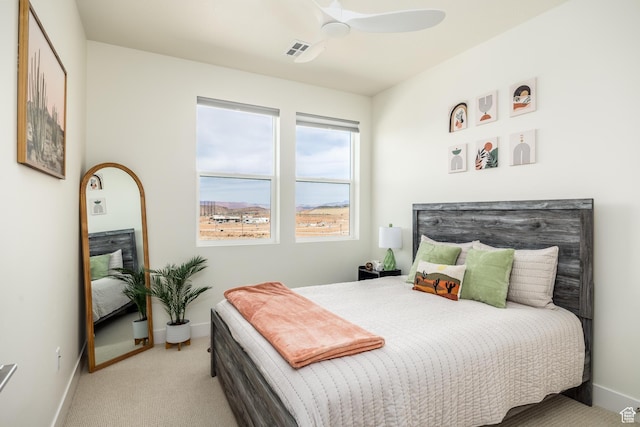 757 W Periwinkle Ln Unit 210, St George, UT 84790 - carpeted bedroom featuring baseboards and a ceiling fan