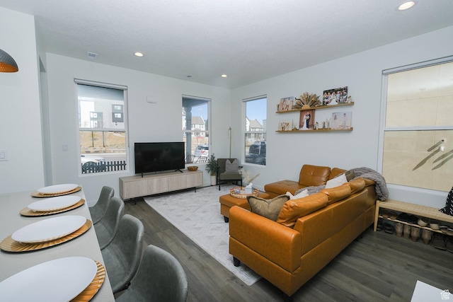 6219 W S Jordan Pkwy Unit 221, South Jordan, UT 84009 - living area with recessed lighting, plenty of natural light, and wood finished floors