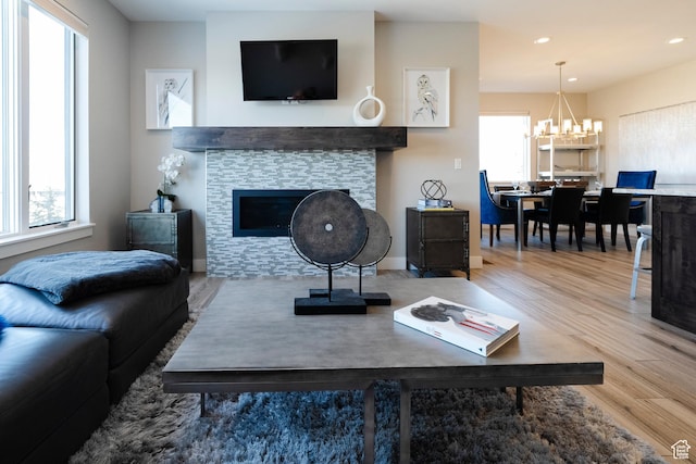 6394 E 850 S, Huntsville, UT 84317 - living room with wood finished floors, a chandelier, a fireplace, and recessed lighting