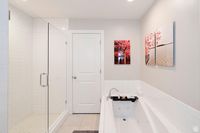 6394 E 850 S, Huntsville, UT 84317 - full bathroom with a sink, a shower stall, tile patterned floors, a tub with jets, and tile walls