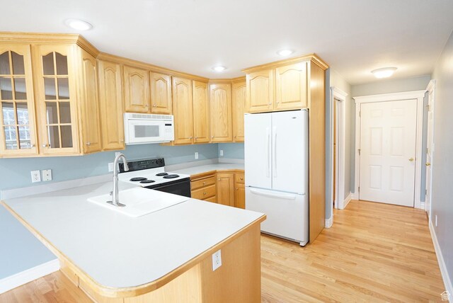 1046 E 1100 S, Spanish Fork, UT 84660 - kitchen featuring white appliances, light brown cabinets, a peninsula, light countertops, and recessed lighting