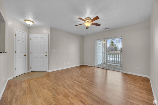 3860 S Mccall St Unit 2D, South Salt Lake, UT 84115 - empty room featuring light wood-style flooring, baseboards, ceiling fan, and visible vents