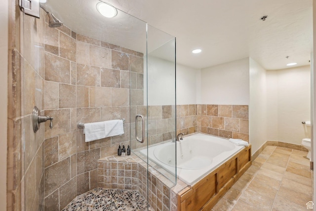 3855 Grand Summit Dr Unit 701Q3, Park City, UT 84098 - bathroom featuring a tub with jets, toilet, baseboards, and tiled shower