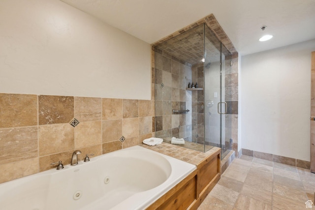 3855 Grand Summit Dr Unit 701Q3, Park City, UT 84098 - bathroom with a stall shower, a whirlpool tub, and baseboards