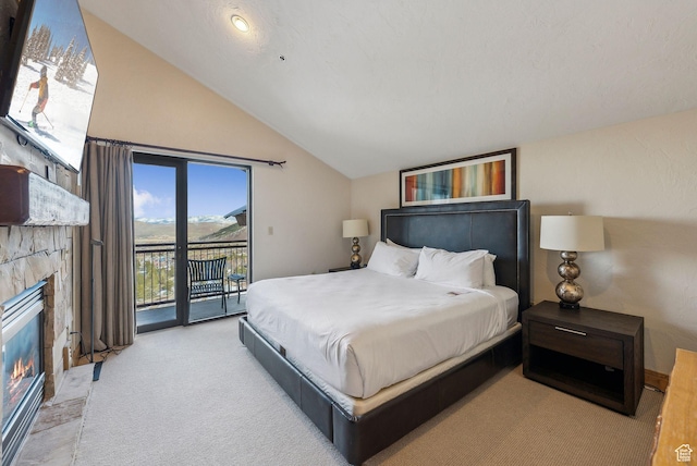 3855 Grand Summit Dr Unit 701Q3, Park City, UT 84098 - bedroom featuring lofted ceiling, access to exterior, a glass covered fireplace, and carpet flooring