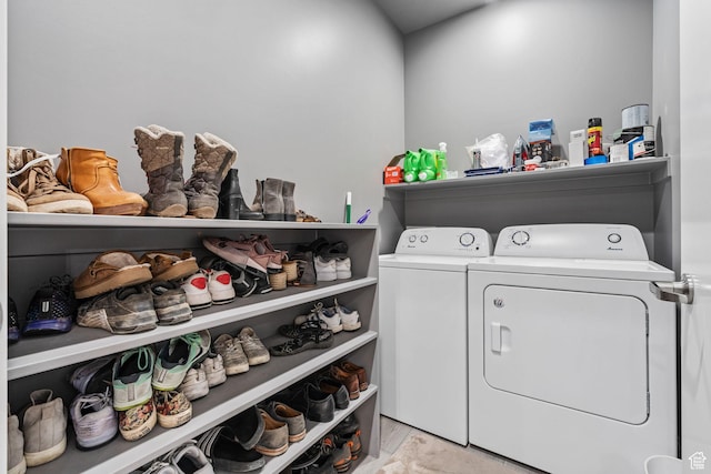 washroom featuring independent washer and dryer and laundry area