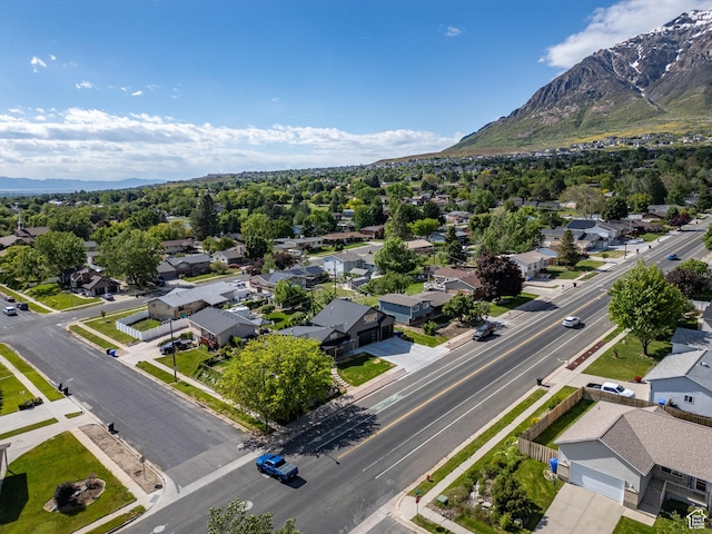 aerial view featuring a mountain view and a residential view