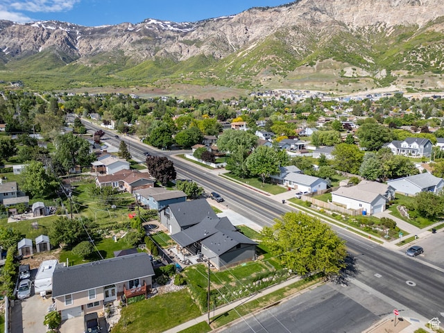 birds eye view of property with a residential view and a mountain view