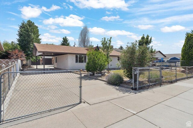 760 E 8080 S, Sandy, UT 84094 - single story home featuring a gate, an attached carport, and brick siding