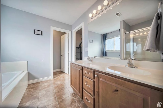 1951 N Hollow Ct, Lehi, UT 84043 - bathroom featuring visible vents, a sink, double vanity, and a shower stall