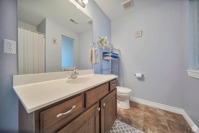 1951 N Hollow Ct, Lehi, UT 84043 - bathroom with baseboards, visible vents, toilet, and vanity