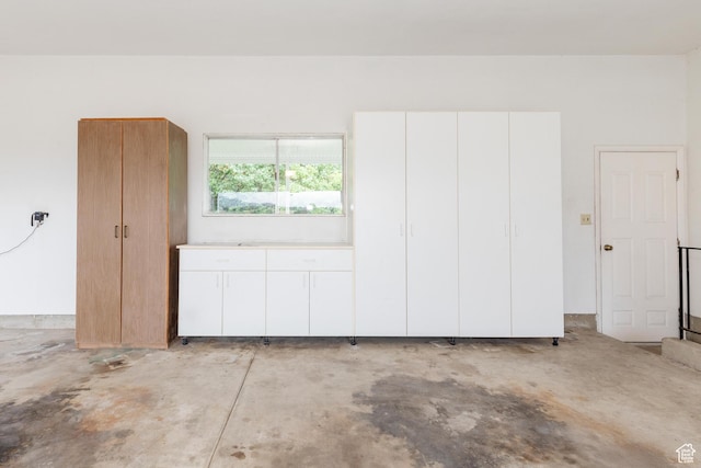 interior space with concrete floors