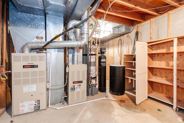 utility room with gas water heater