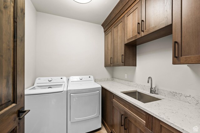 481 Thorn View Ct Unit 6, Kamas, UT 84036 - clothes washing area with a sink, washer and clothes dryer, and cabinet space