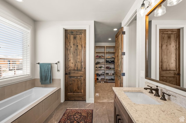 481 Thorn View Ct Unit 6, Kamas, UT 84036 - full bathroom with vanity, a walk in closet, recessed lighting, and a bath