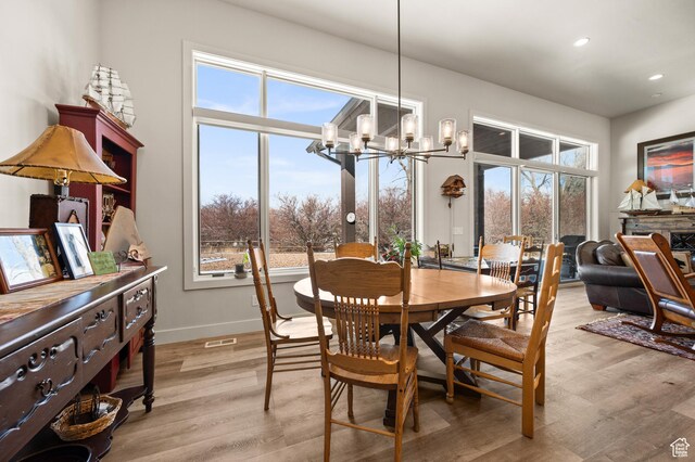 481 Thorn View Ct Unit 6, Kamas, UT 84036 - dining area featuring baseboards, light wood-style flooring, recessed lighting, and an inviting chandelier