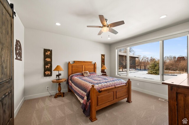481 Thorn View Ct Unit 6, Kamas, UT 84036 - bedroom with baseboards, visible vents, and light colored carpet