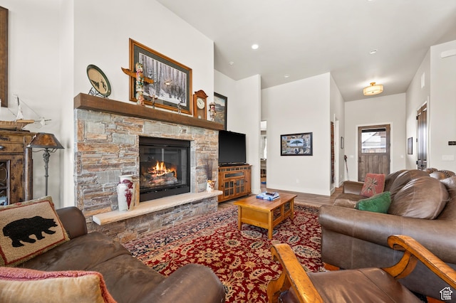 481 Thorn View Ct Unit 6, Kamas, UT 84036 - living room with baseboards, a fireplace, and wood finished floors