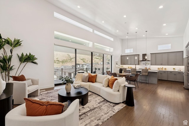 5641 N Canyon Rim Rd, Lehi, UT 84043 - living area with a towering ceiling, dark wood-type flooring, and recessed lighting