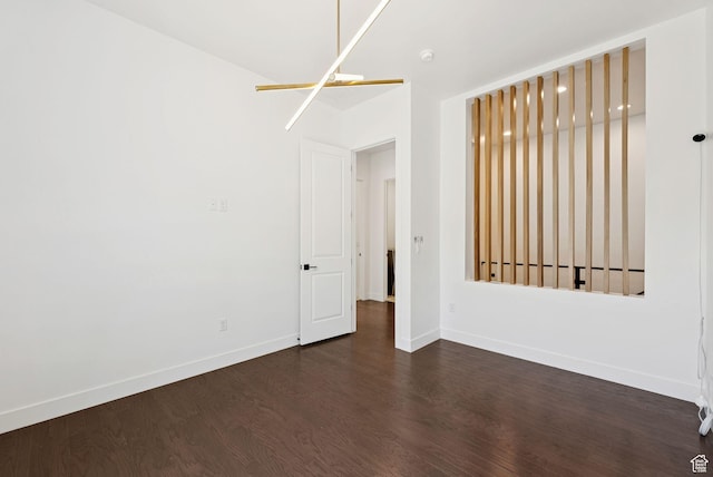 5641 N Canyon Rim Rd, Lehi, UT 84043 - spare room with dark wood finished floors, baseboards, and a smoke detector
