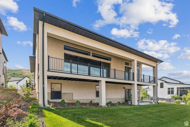 5641 N Canyon Rim Rd, Lehi, UT 84043 - rear view of property featuring a balcony and stucco siding