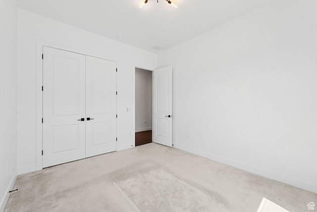 5641 N Canyon Rim Rd, Lehi, UT 84043 - unfurnished bedroom featuring carpet, a closet, and baseboards