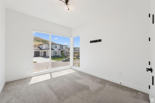 5641 N Canyon Rim Rd, Lehi, UT 84043 - carpeted spare room with baseboards