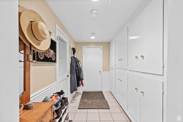 1376 Granada Dr, Bountiful, UT 84010 - doorway with wainscoting and light tile patterned floors
