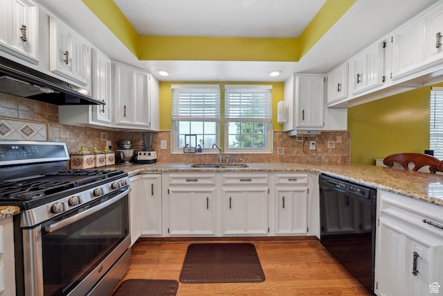 1376 Granada Dr, Bountiful, UT 84010 - kitchen featuring white cabinets, stainless steel gas range, dishwasher, under cabinet range hood, and a sink