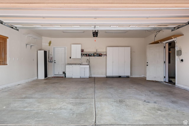 208 N Guidelight Dr, Cedar City, UT 84720 - garage with baseboards and a garage door opener