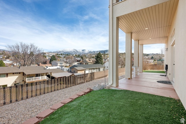 208 N Guidelight Dr, Cedar City, UT 84720 - view of yard with a fenced backyard, a residential view, and a mountain view