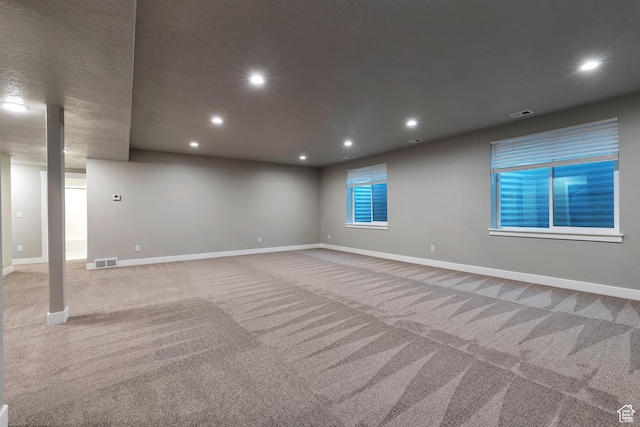 3240 W Oxford Loop Unit 219, Mountain Green, UT 84050 - interior space with carpet flooring, visible vents, baseboards, and recessed lighting