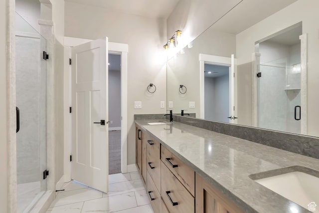 3240 W Oxford Loop Unit 219, Mountain Green, UT 84050 - full bathroom with marble finish floor, double vanity, a sink, and a stall shower