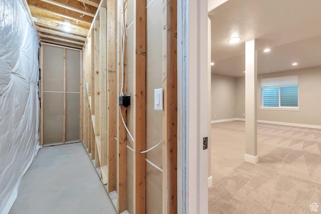 3240 W Oxford Loop Unit 219, Mountain Green, UT 84050 - corridor with baseboards and recessed lighting