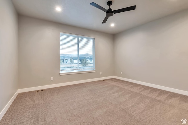 3240 W Oxford Loop Unit 219, Mountain Green, UT 84050 - carpeted spare room with a ceiling fan, baseboards, and recessed lighting