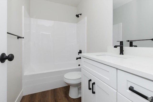 174 N 300 W, Preston, ID 83263 - bathroom with wood finished floors, toilet, vanity, and washtub / shower combination